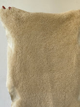 Fluffy offwhite sheep skin