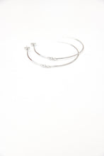 Large fine hoops with a small snake