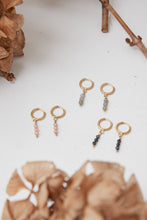 Dangly hoop three stone earrings grey