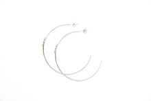 Large fine hoops with a small snake