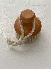 Face brush hanging