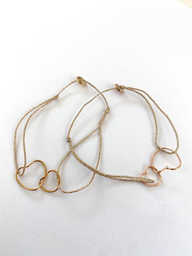 attached hearts bracelet on lurex string