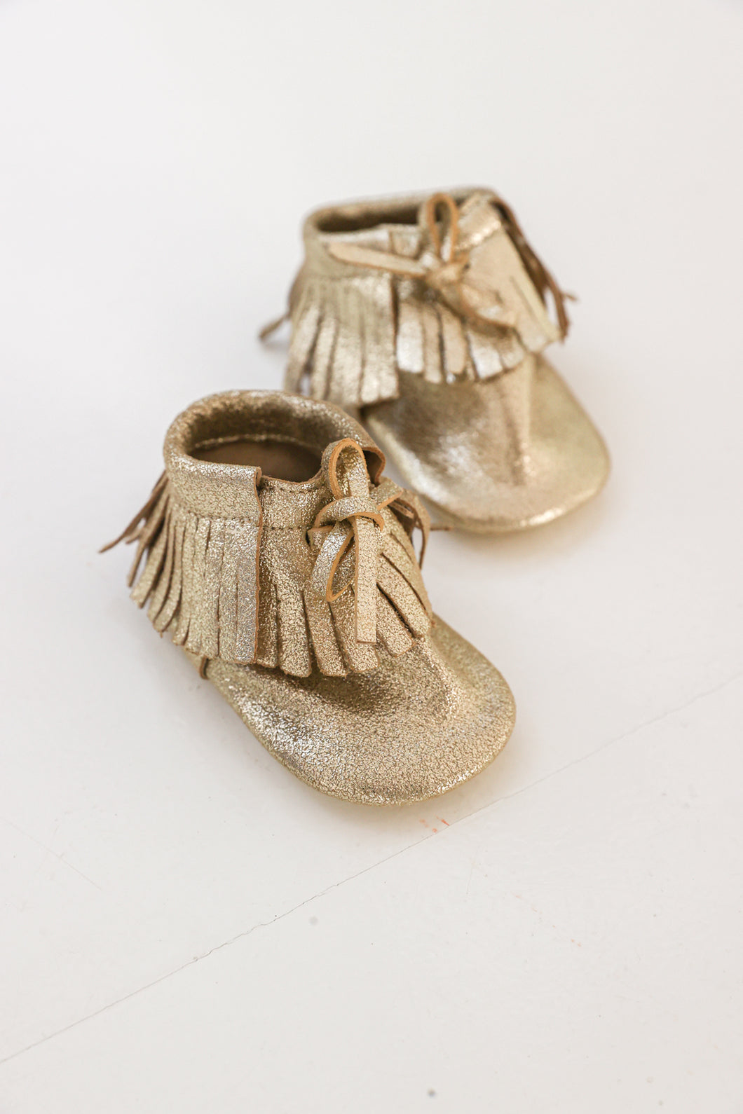 fringe leather gold shoes