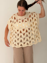 Loose sleeveless knit
