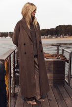 Brown double breasted trench coat
