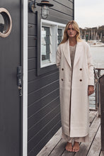 Cream double breasted trench coat
