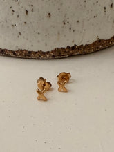 X stud earrings