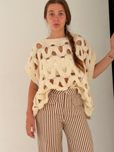 Loose sleeveless knit