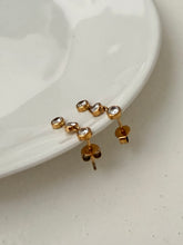 Triple diamond dangly studs