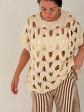 Loose sleeveless knit