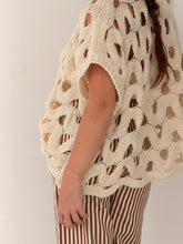 Loose sleeveless knit