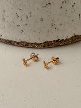X stud earrings