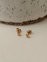 X stud earrings