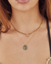 Fine necklace with stone medallion