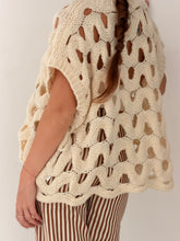 Loose sleeveless knit