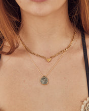 Fine necklace with stone medallion