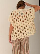 Loose sleeveless knit