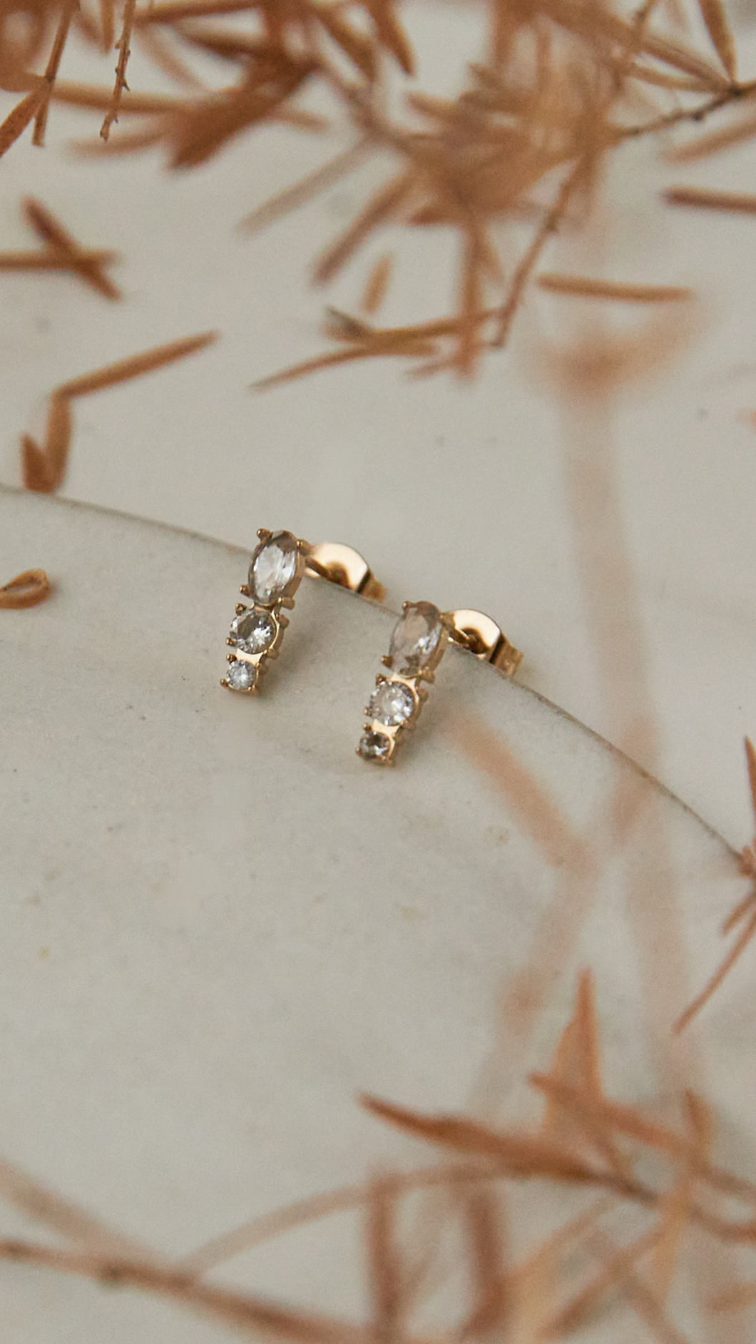 Three gem stud earring