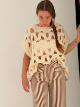 Loose sleeveless knit