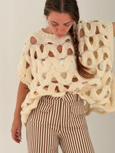Loose sleeveless knit