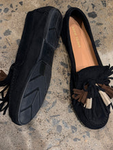 mocassins with fringe and pompom