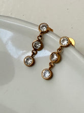Triple diamond dangly studs