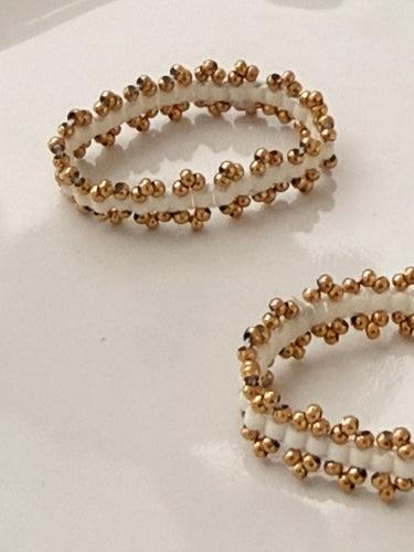 Beaded white ring