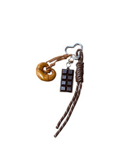 key chains with chocolate and croissant