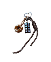key chains with chocolate and croissant