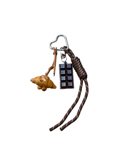 key chains with chocolate and croissant