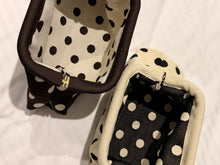 polka dots clutch