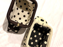 polka dots clutch