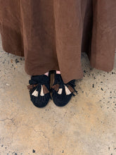 mocassins with fringe and pompom