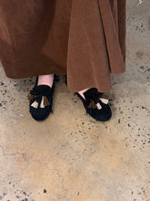 mocassins with fringe and pompom