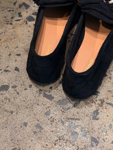 mocassins with fringe and pompom