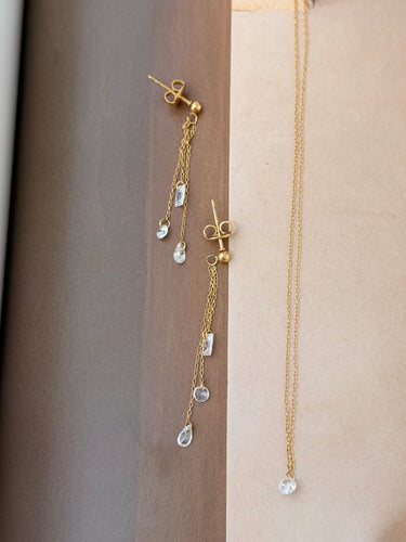 Clear gem necklace and hanging earrings