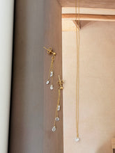 Clear gem necklace and hanging earrings