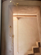 Clear gem necklace and hanging earrings