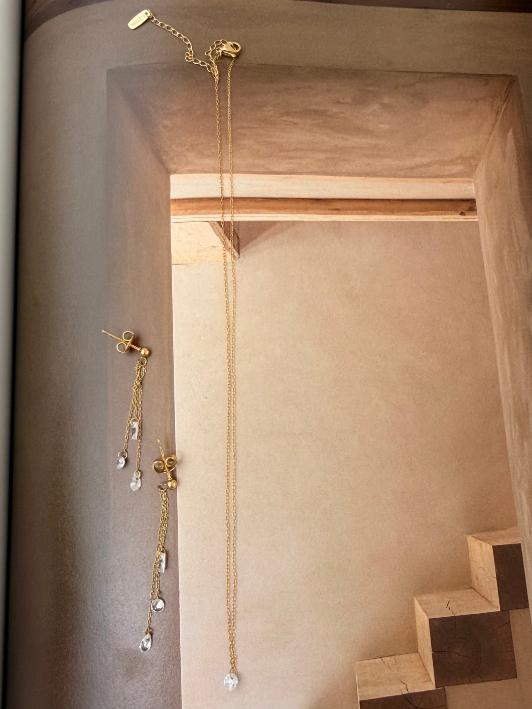 Clear gem necklace and hanging earrings