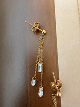 Clear gem necklace and hanging earrings