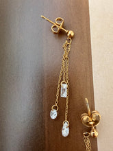 Clear gem necklace and hanging earrings