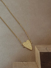 Heart bracelet on fine chain