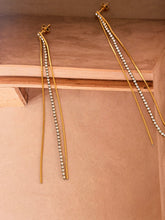 Long chain and diamonty earrings