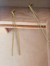 Long chain and diamonty earrings