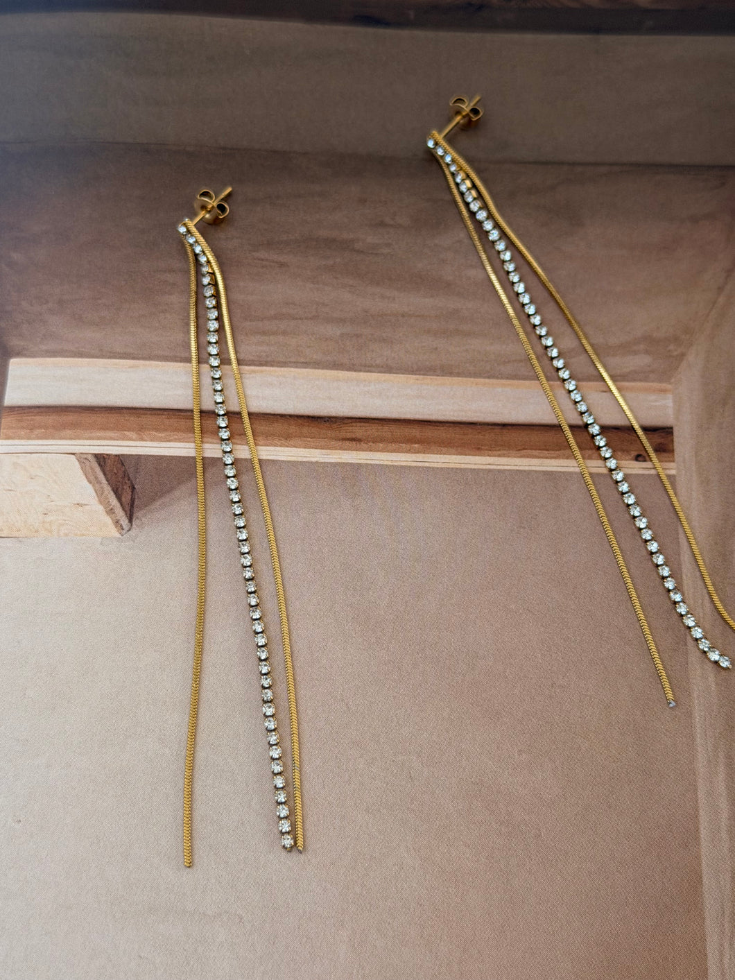 Long chain and diamonty earrings