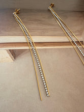 Long chain and diamonty earrings