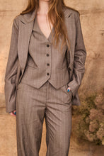 Pinstripe beige suit