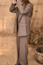 Pinstripe beige suit