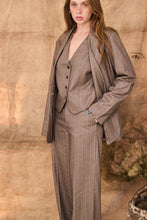 Pinstripe beige suit