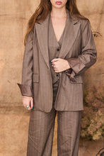 Pinstripe beige suit